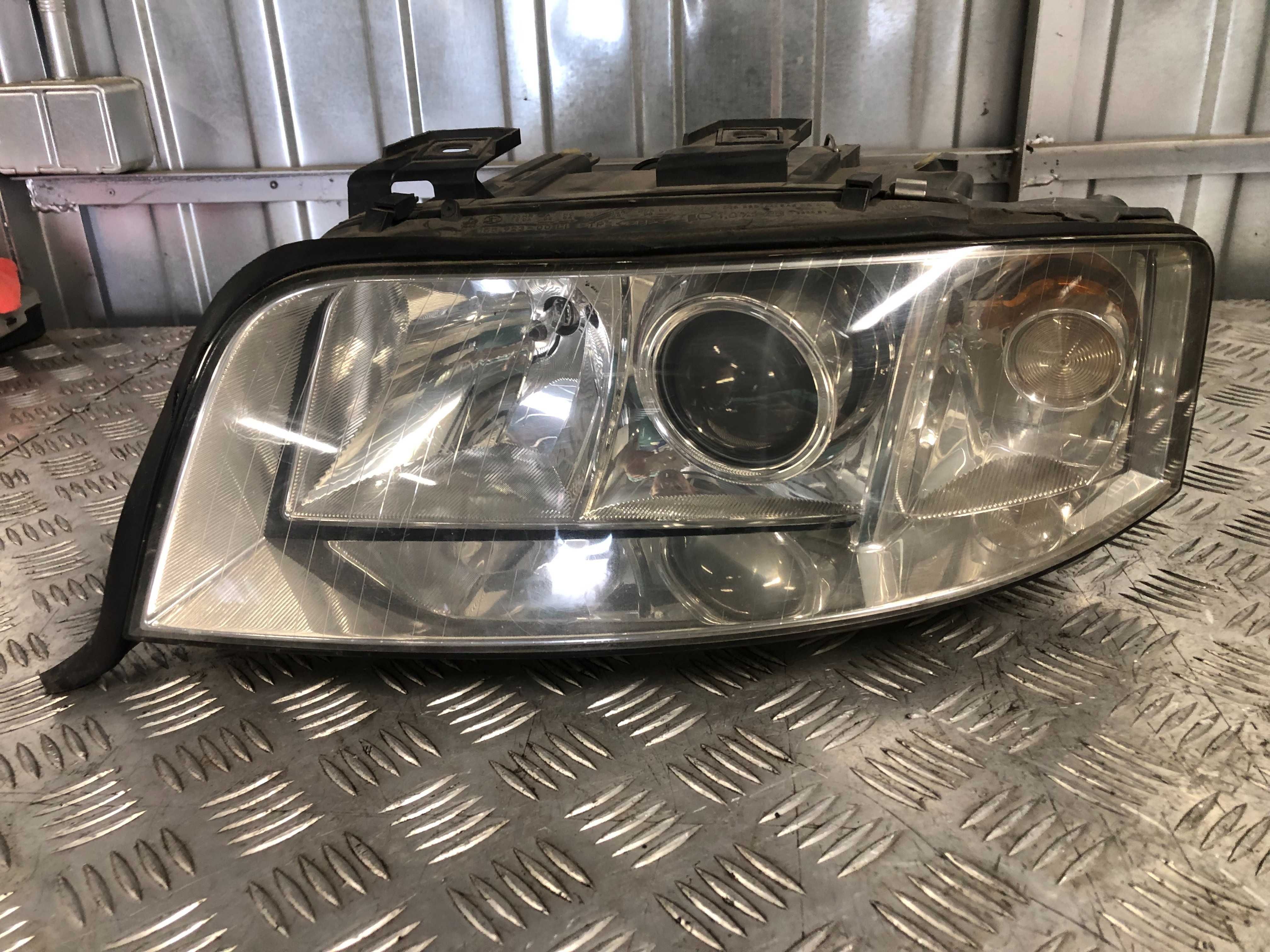 Lampa lewy przód Xenon Hella Audi A6 C5 lift Europa Ładna