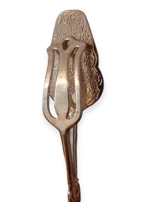 Щипцы  посеребренные для выпечки .