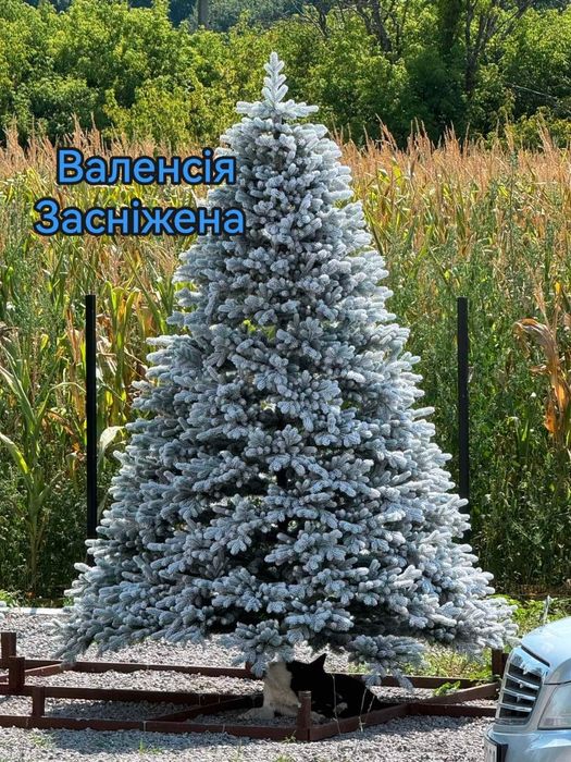 Під замовлення. Лита ялиночка Валенсія засніжена на металевих крабах.