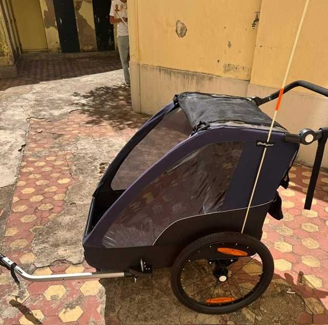 Atrelado de bicicleta para crianças