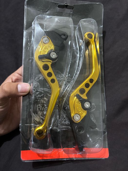 Рычаги мотоцикла, курки тормоза и сцепления, универсальные ручки