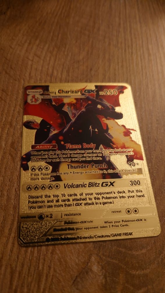 Karta pokemon Shining Charizard gx gold
