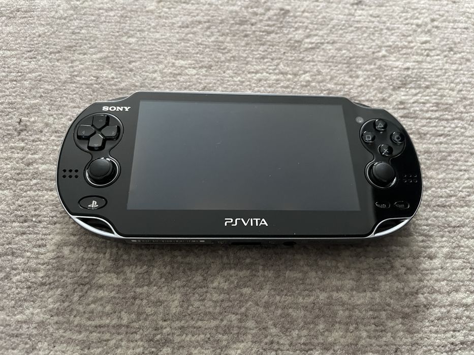 PS Vita com caixa original, 8 jogos e bolsa de transporte