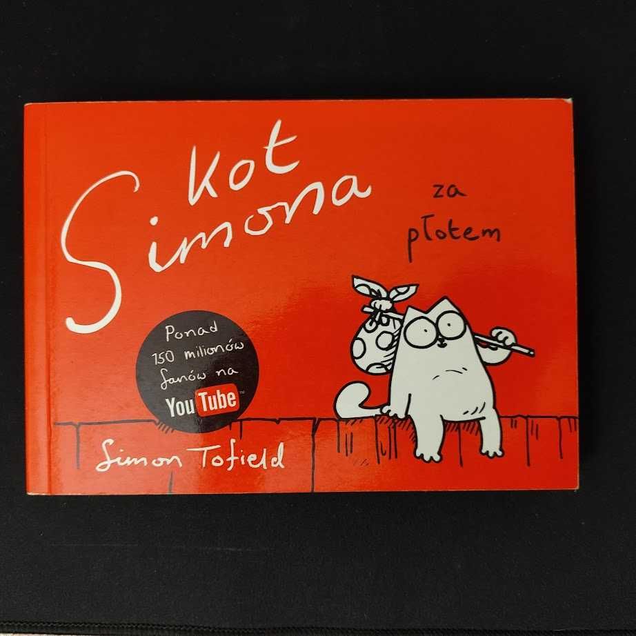 Kot Simona za płotem