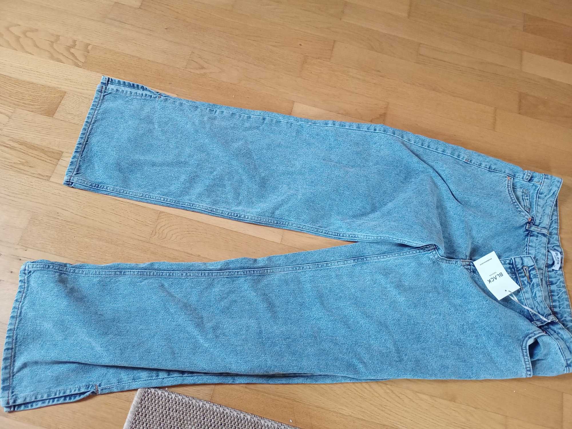 Damskie spodnie dżinsowe 40