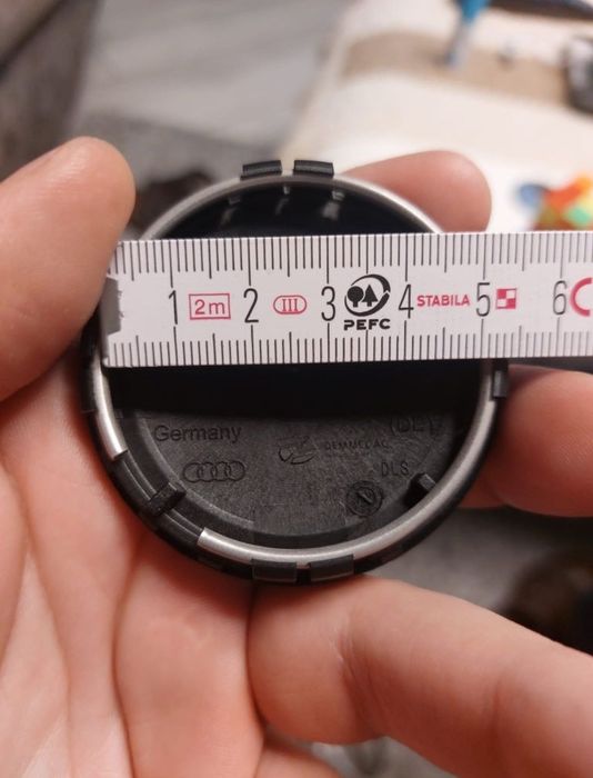 Nowe oryginalne dekielki/ zaślepki do Felg Audi 81A.601.170/komplet