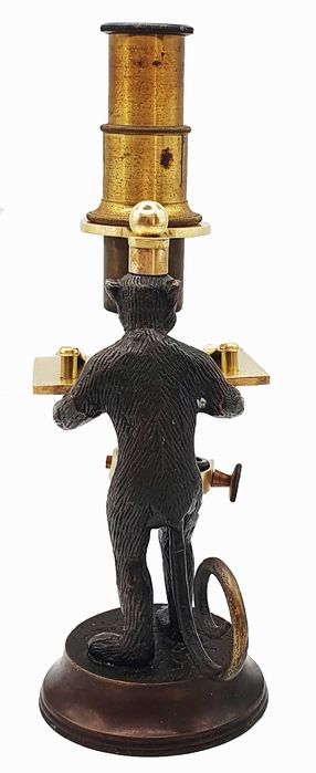 Brass reproduction of a “monkey microscope”