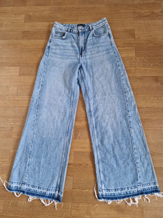 Spodnie jeansy dzwony flare wide leg Cropp M 38