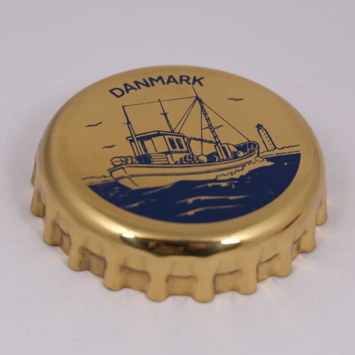 Otwieracz do butelek kapsel, Georg Jensen, Dania, lata 80.