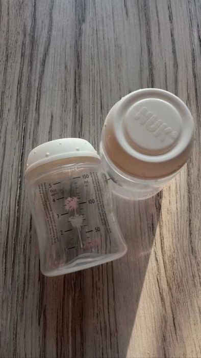 2x pojemnik na mleko butelka NUK First Choice +