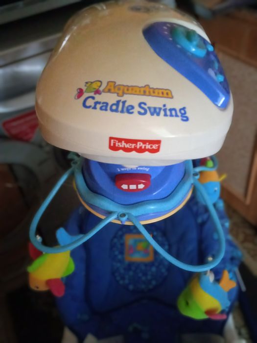 Заколисуючий центр, гойдалка дитяча