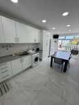 Quarto casal em casa compartilhada