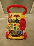 Stabilny pchacz jeździk vtech