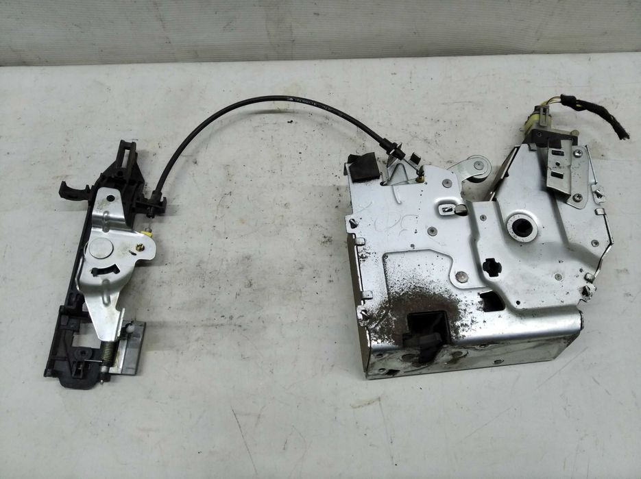 Замок левой сдвижной двери Transit Connect 2002-2013 2T14V264A33BM