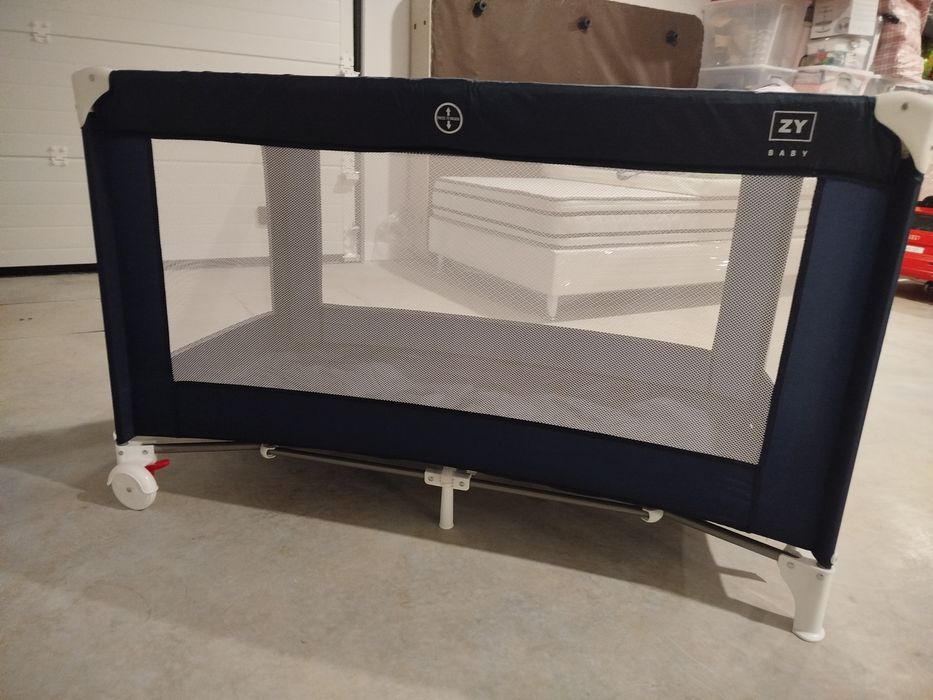 Cama de viagem e colchão