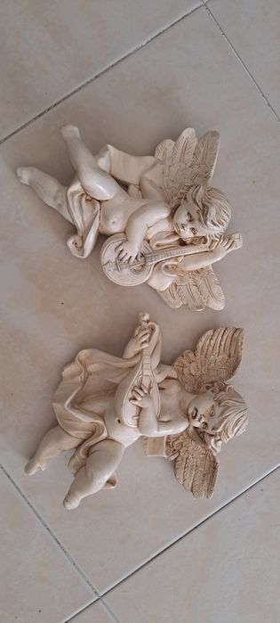 Conjunto de anjos em marfinite