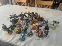 Jogo psp 3 skylanders com 29 bonecos e saco