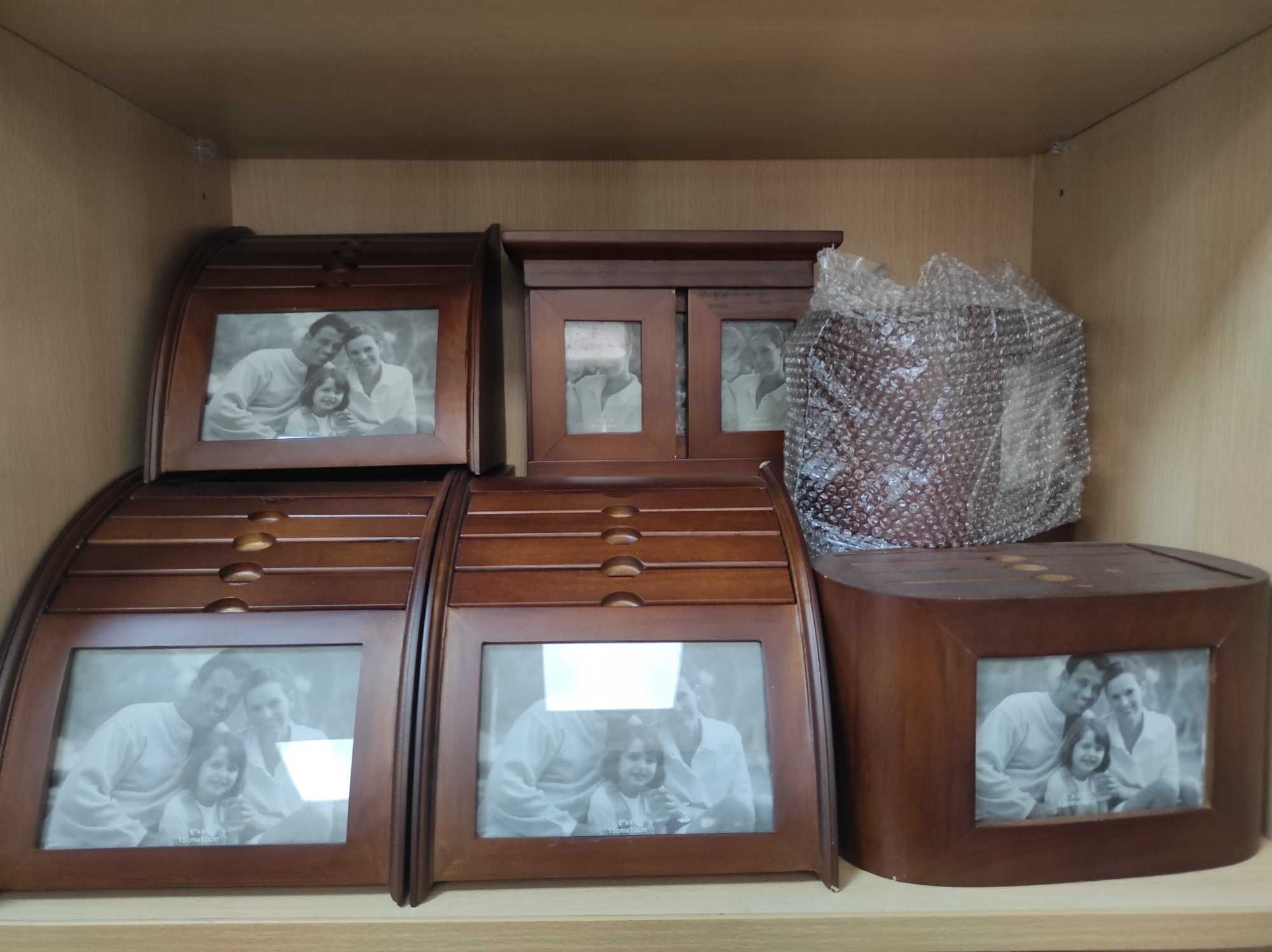 Álbuns de fotos em madeira