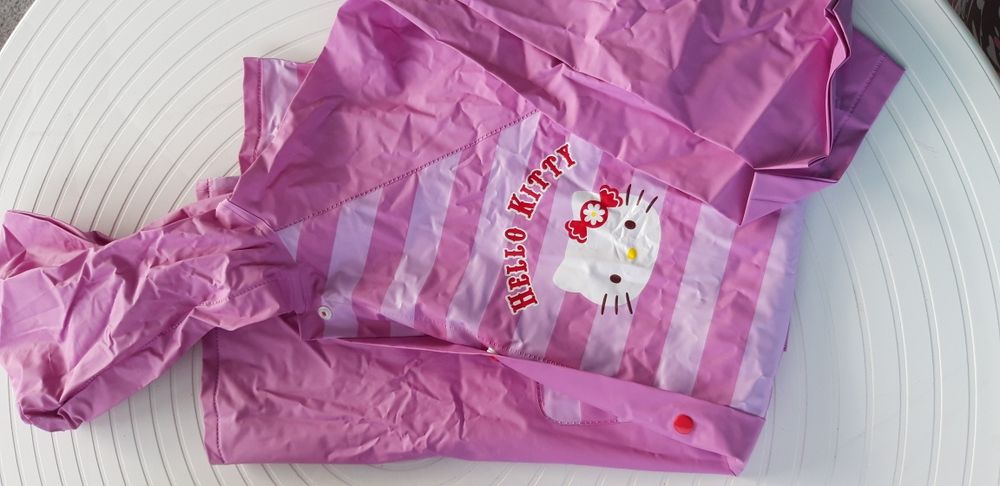 Impermeável e Saco - 8 anos Novo