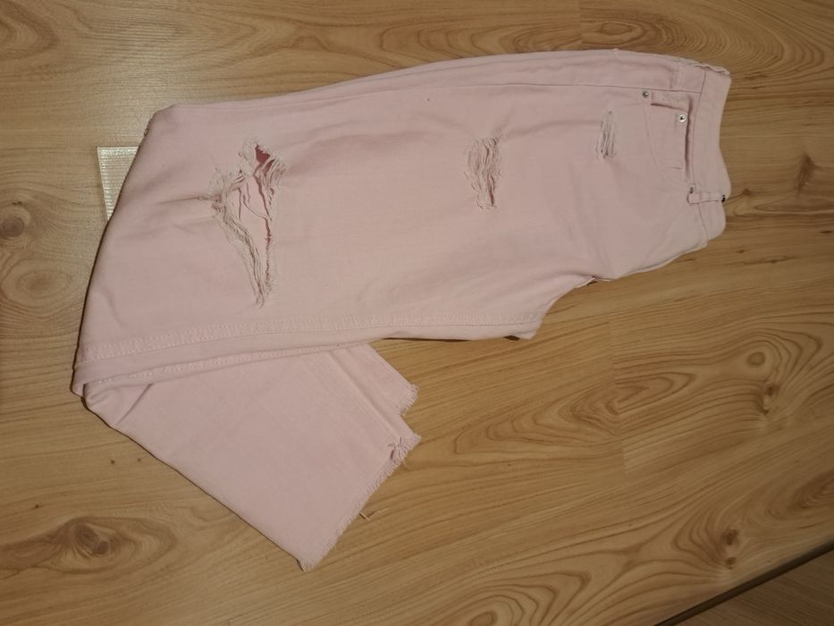 Spodnie z przetarciami  rozm M