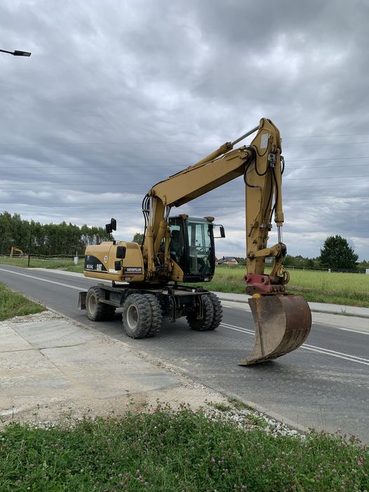 Caterpillar CAT M 316C z Niemiec 9700mth 313 315