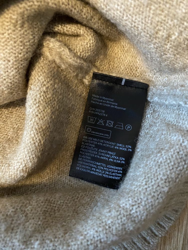 Wełniany Bezrękawnik/Kamizelka swetrowa/sweter w serek.  H&M.