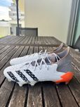 1. Adidas Predator Edge+ FG – White / Orange / Black