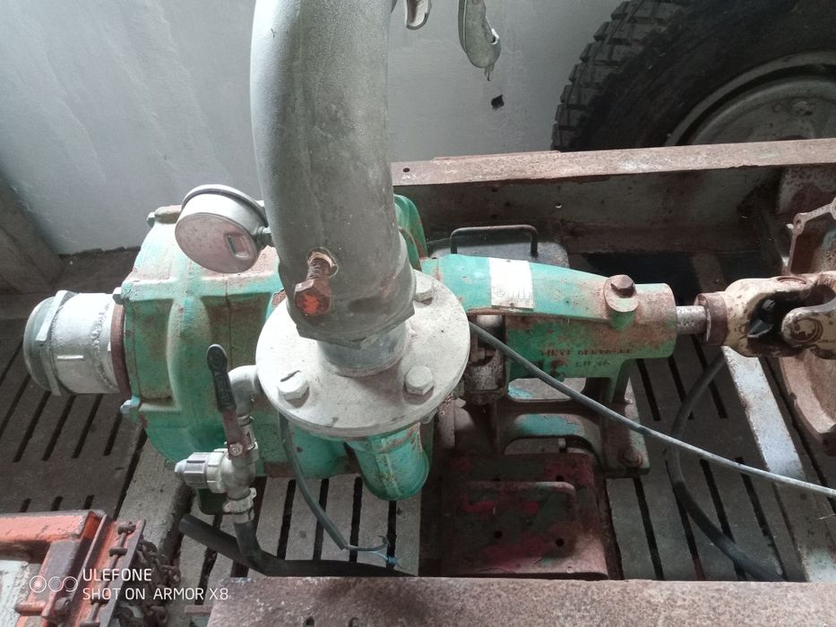 Rolo com canhão de rega e bomba de tirar água