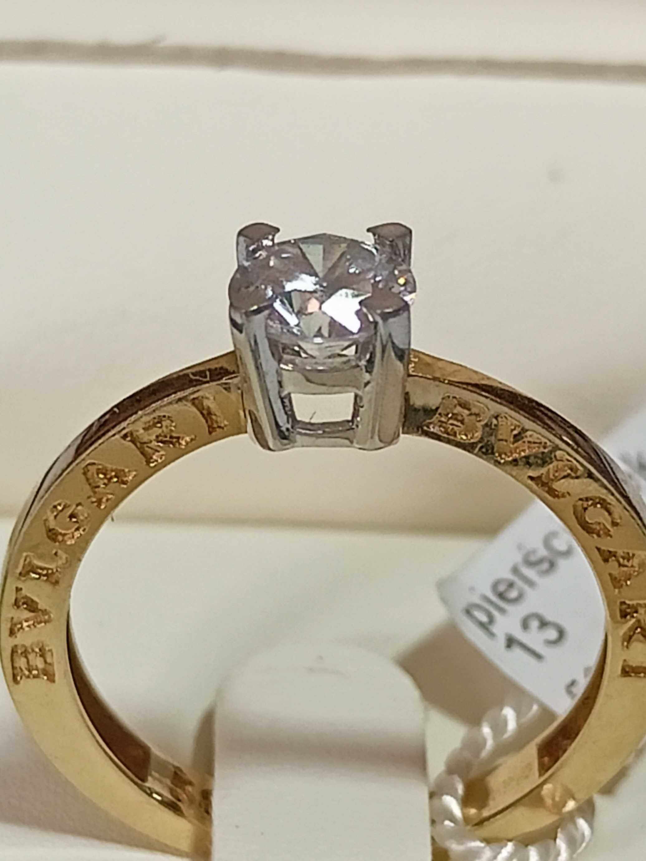 Złoty pierścionek 585 z brylantem 0,60ct (certyfikat)