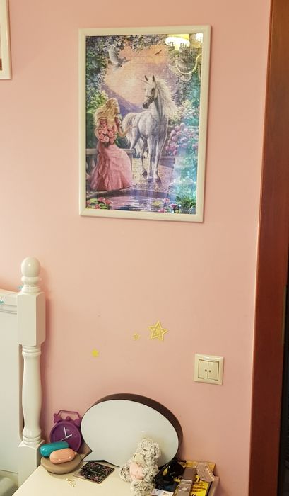 Obraz z puzli duży,  oszklony w drewnianej ramie.