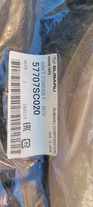 Subaru Кронштейн бампера переднего правый