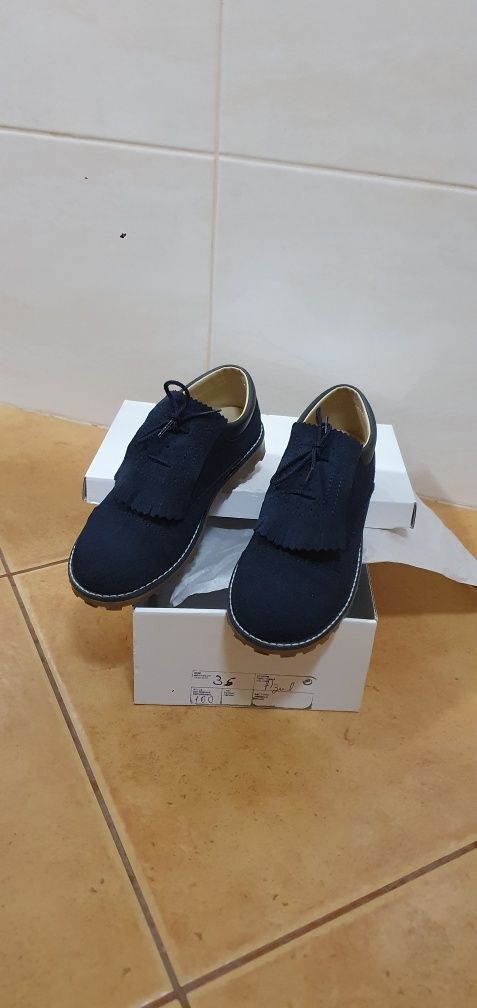 Par sapatos azul criança