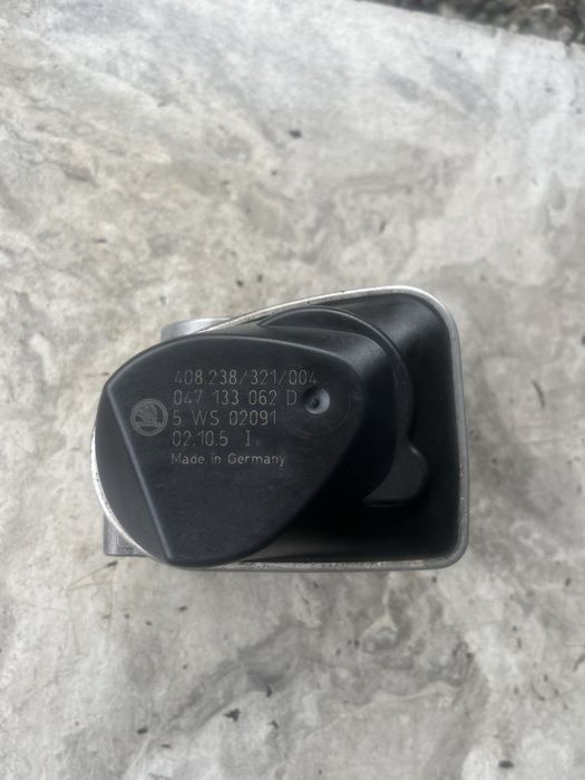 Дросельна заслінка Skoda Fabia 1.4 047133062D
