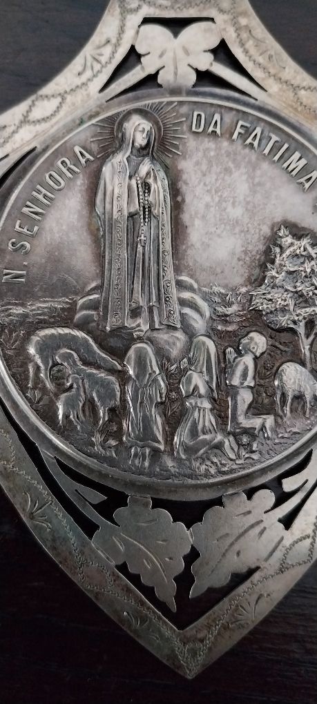 Medalha antiga em prata
