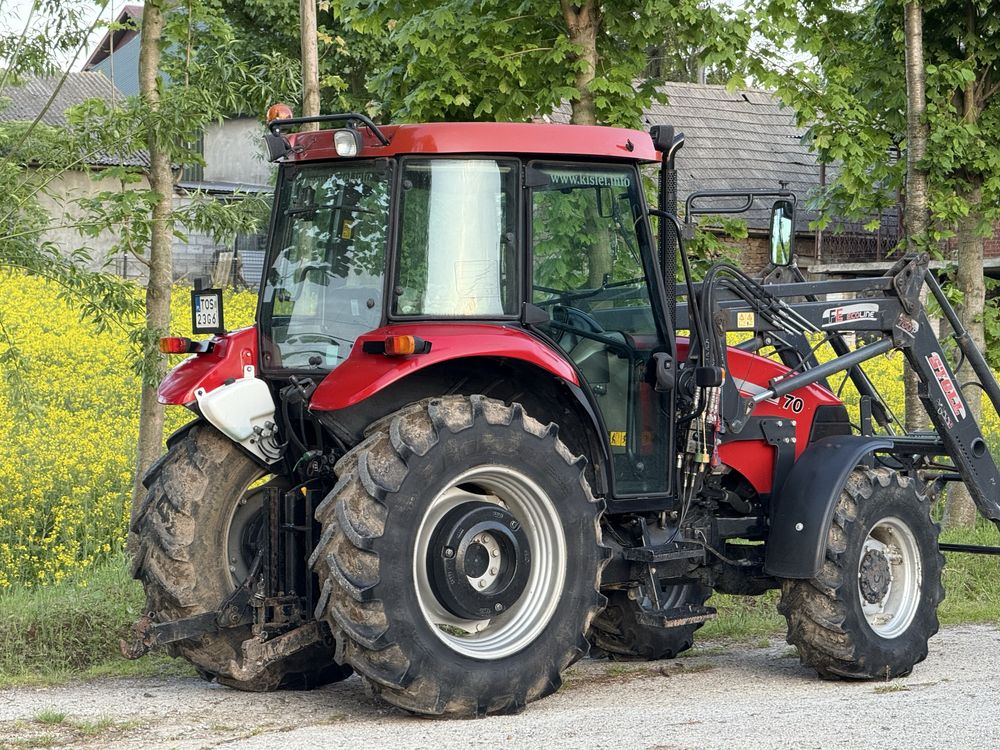 Case JX 70 z ładowaczem czołowym stoll