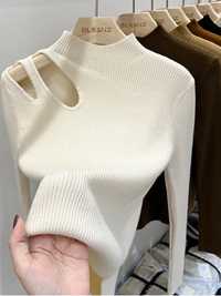 Sweter biały półgolf z dziurami