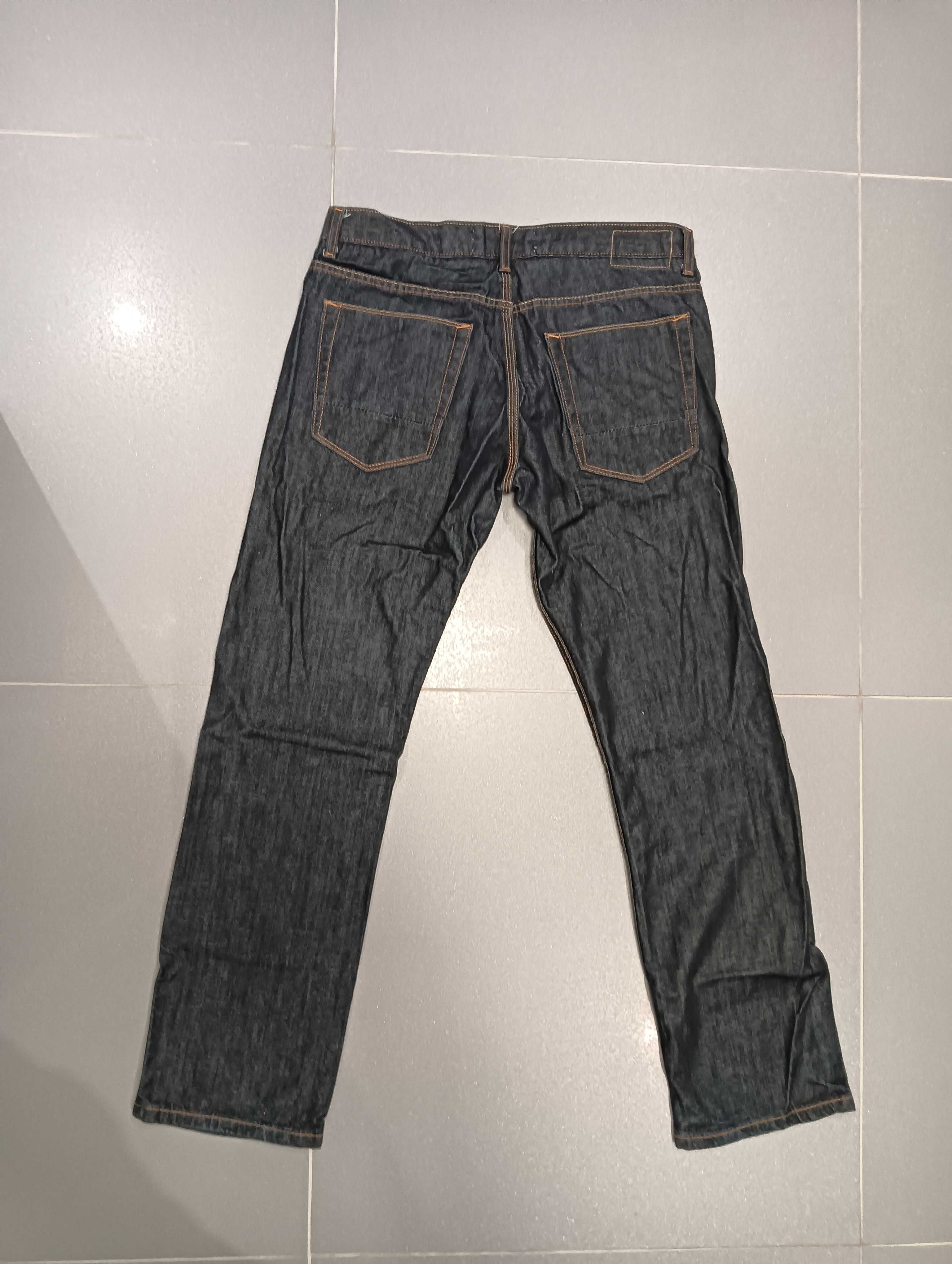 Męskie ciemne granatowe spodnie jeansowe Topman 86 cm nowe