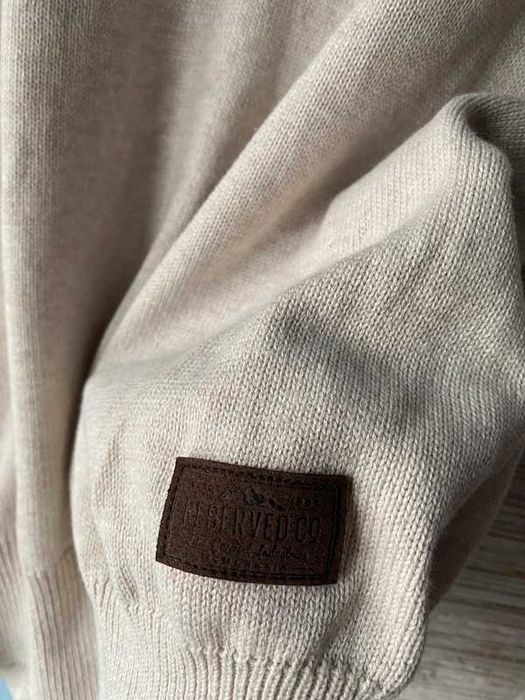 Beżowy sweter z golfem łaty na ramionach Reserved M/38