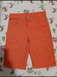 Оранжевые шорты для мальчика фирма H&M