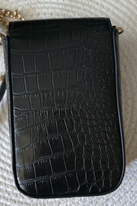 Torebka ze złotym guzikiem