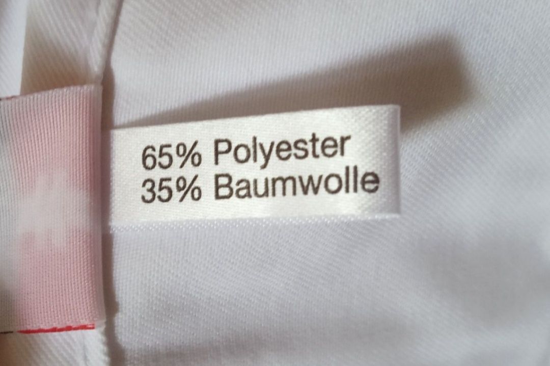 Białe klasyczne spodnie