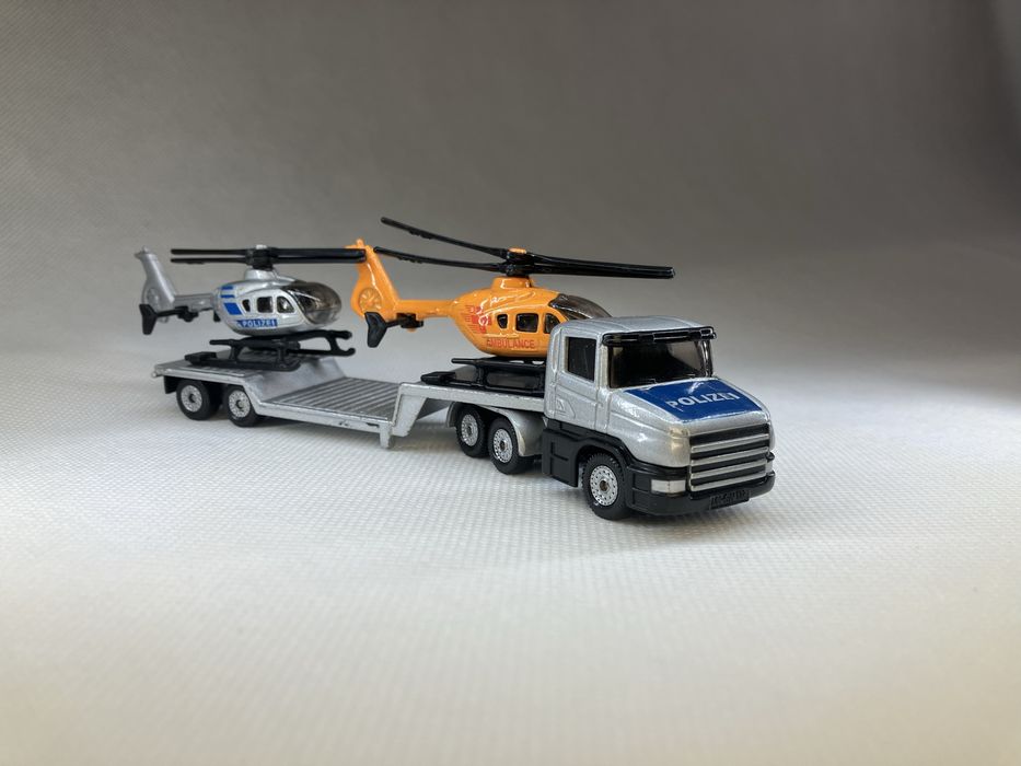 Resorak Scania plus dwa helikoptery Siku
