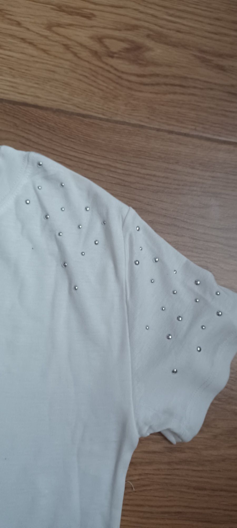 Nowa koszulka bluzka ozdoby na ramionach r.XL
