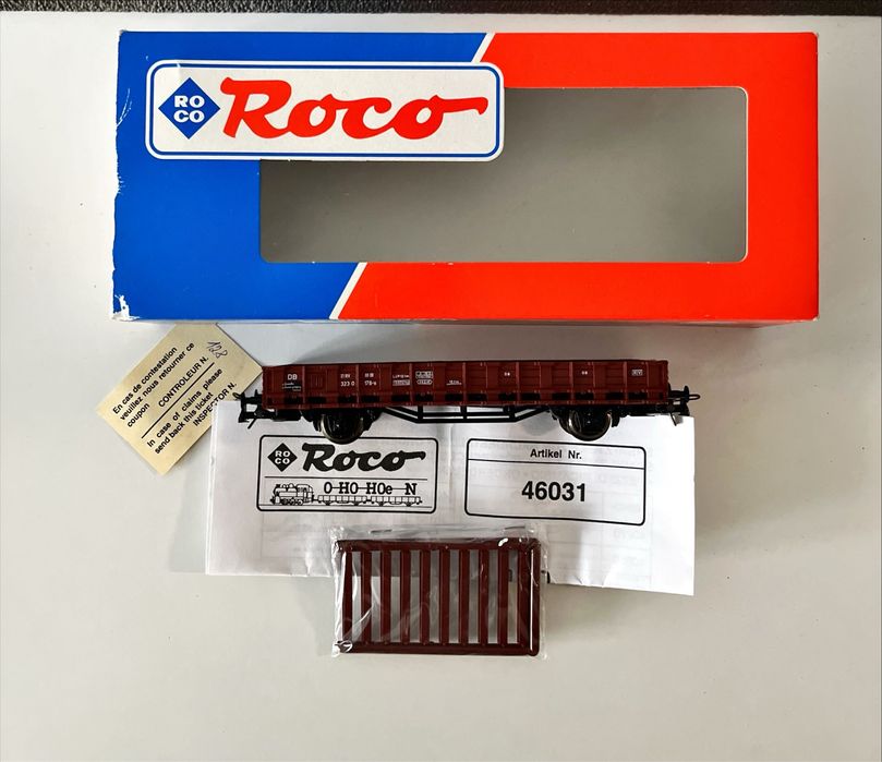 ROCO 46031 NOWY Wagon platforma z kłonicami DB. Skala H0. Epoka IV