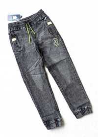 Jeansowe szare spodnie dla chłopca  nowy  134-140