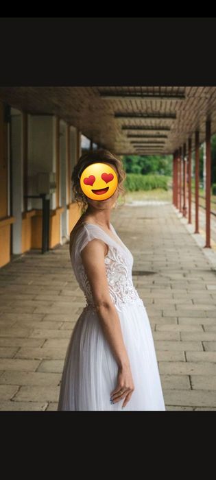 Sprzedam suknię ślubną  typu  princess  w kolorze śnieżnej  bieli.