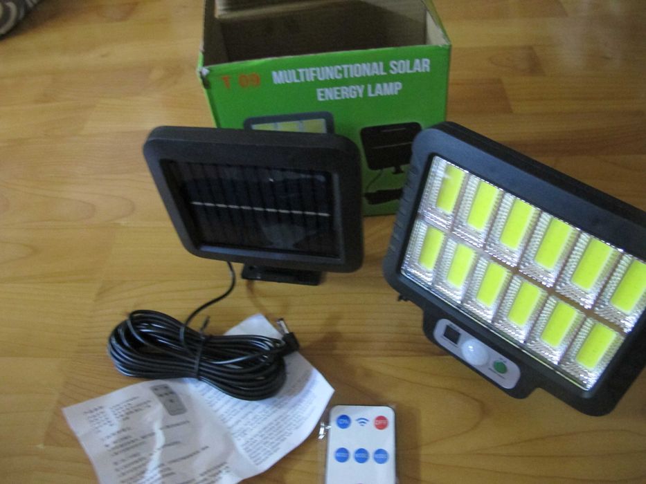 LED лампа + сонячна батарея + пульт ду і датчик руху