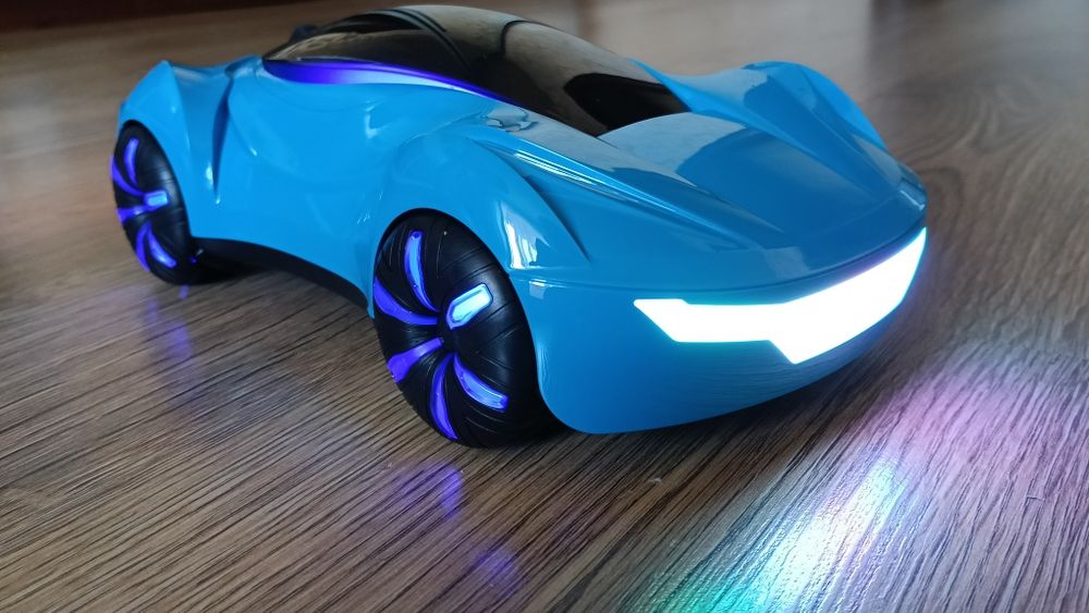 Новинка 2025.іграшка спортивна машинка на пульті  4wd  дим музика дриф