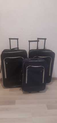 3 walizki czarne i granatowa