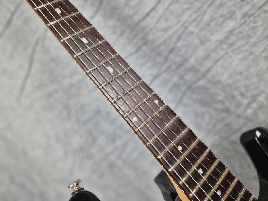 Sterling by Music Man JP100 Transparent Black - Sygnatura Petrucci'ego